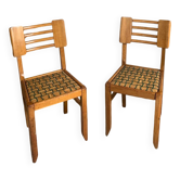 Pair of chairs in the style of Pierre Cruege