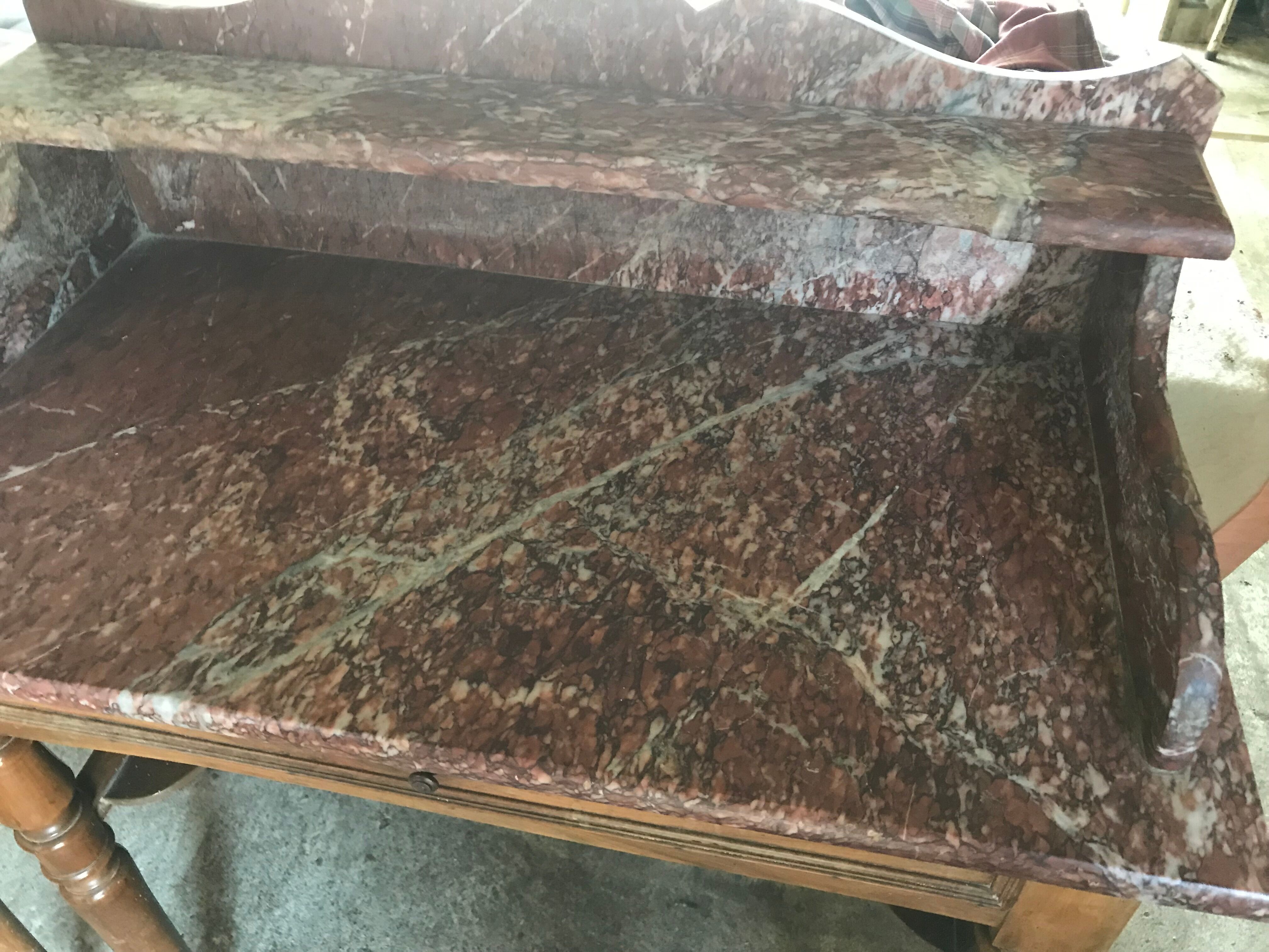 Toilet table on red marble
