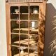 Raw wood display cabinet