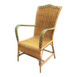 Rattan armchair with armrests