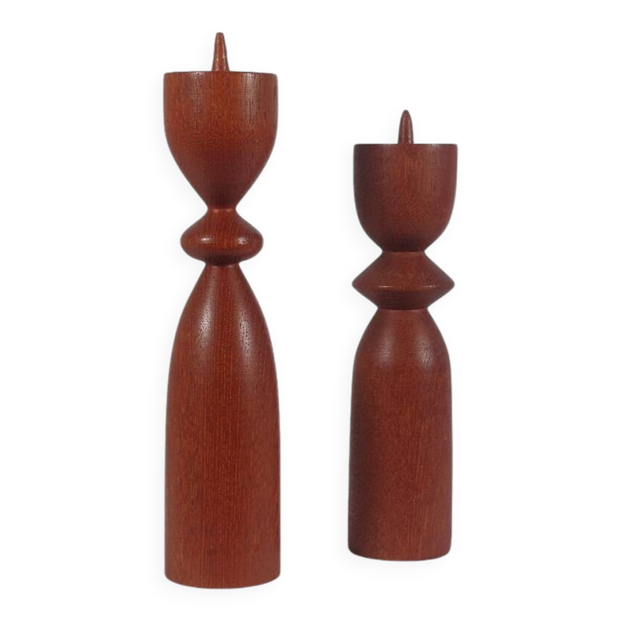 Vintage pair of sculptural teak candlesticks in Scandinavian style.