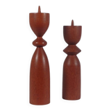 Vintage pair of sculptural teak candlesticks in Scandinavian style.