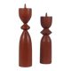 Vintage pair of sculptural teak candlesticks in Scandinavian style.