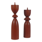 Vintage pair of sculptural teak candlesticks in Scandinavian style.