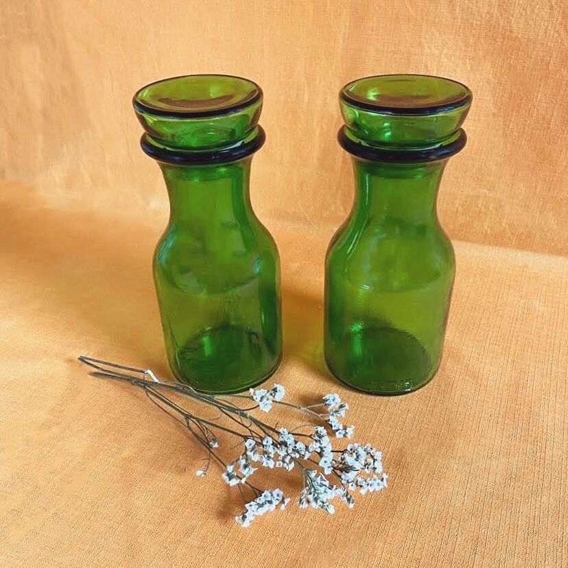 Green glass apothecary pots