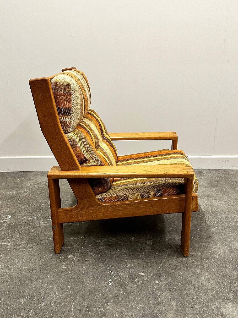 Vintage large elm wood lounge chair with original fabric, 1970s France