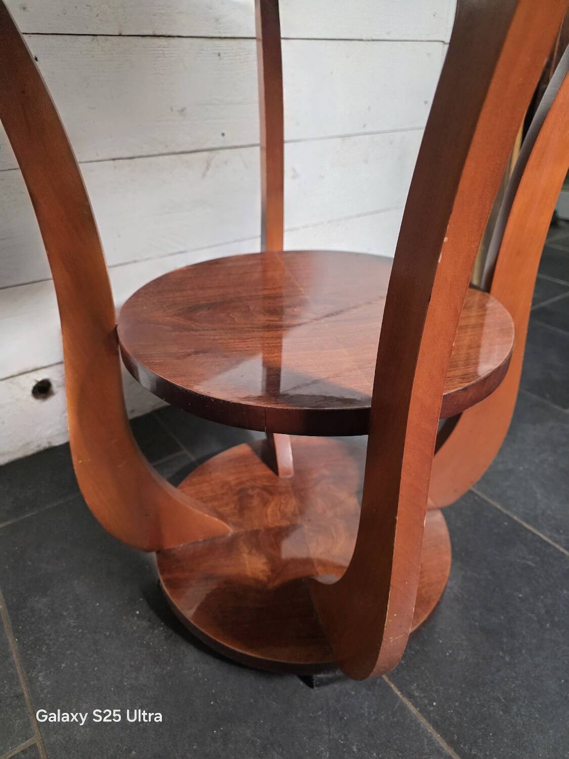 Art Deco walnut gueridon with double top from the 1930s.