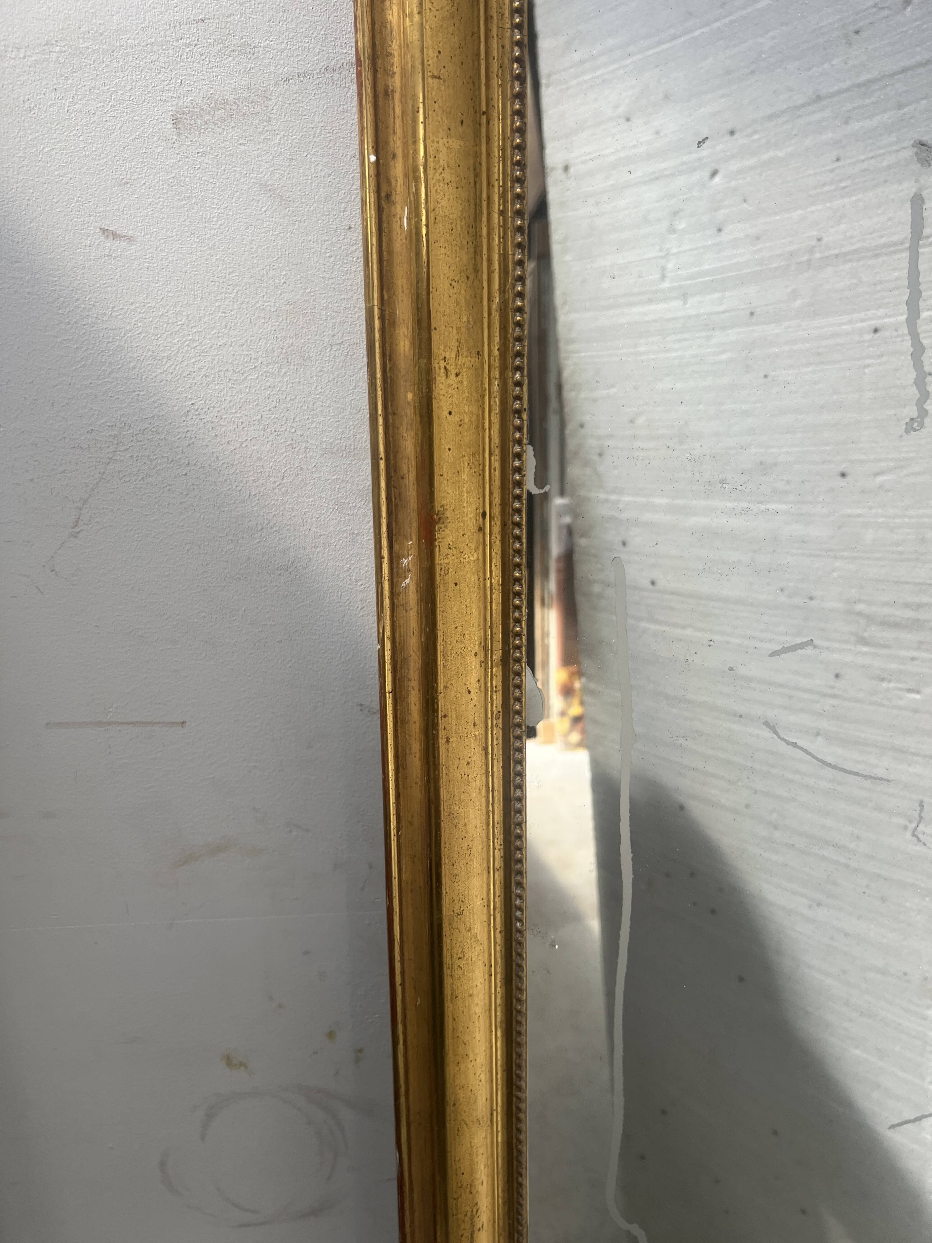Louis XV style mirror in gilded wood and stucco