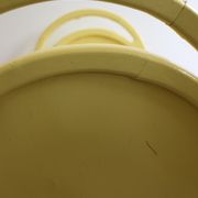 Yellow vintage baby cot