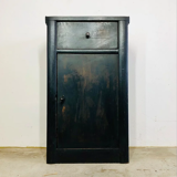 Antique black patinated bedside table