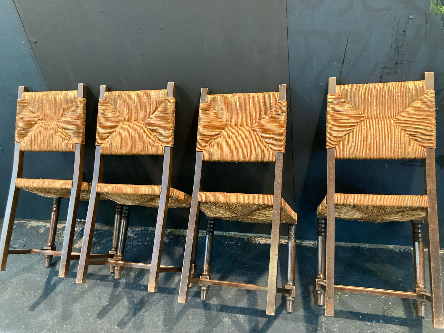 Four straw chairs