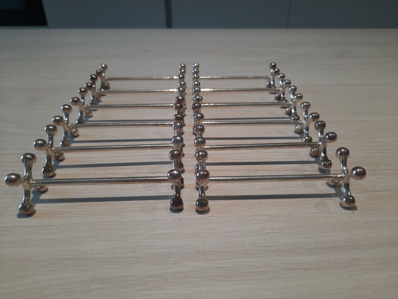 Set of 12 silver metal knife holders
