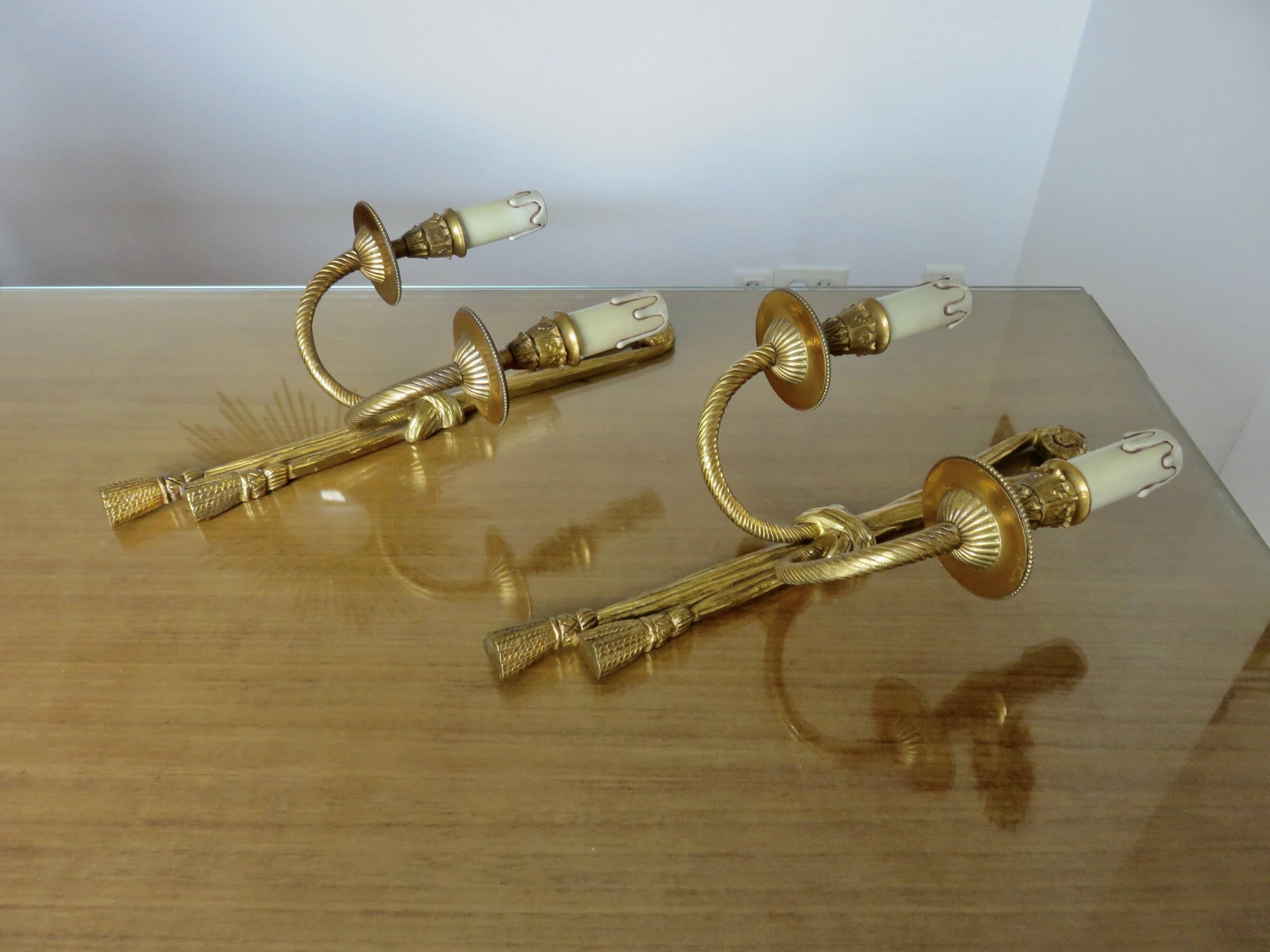 Pair of bronze wall lights, knots and tassels, Peris Andreu edition, 1970