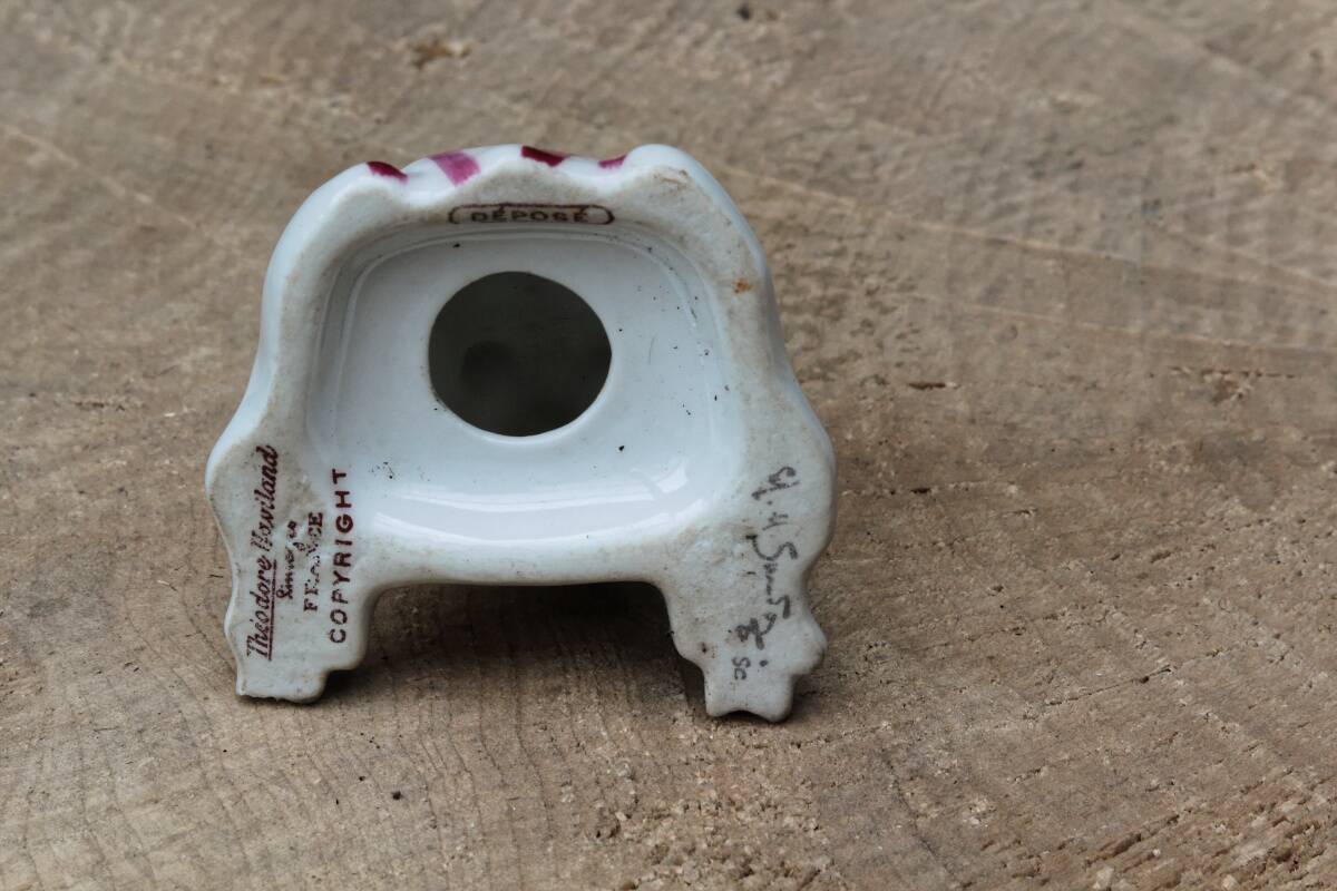 Pair of salt and pepper shakers by Edouard Marcel Sandoz for Haviland.