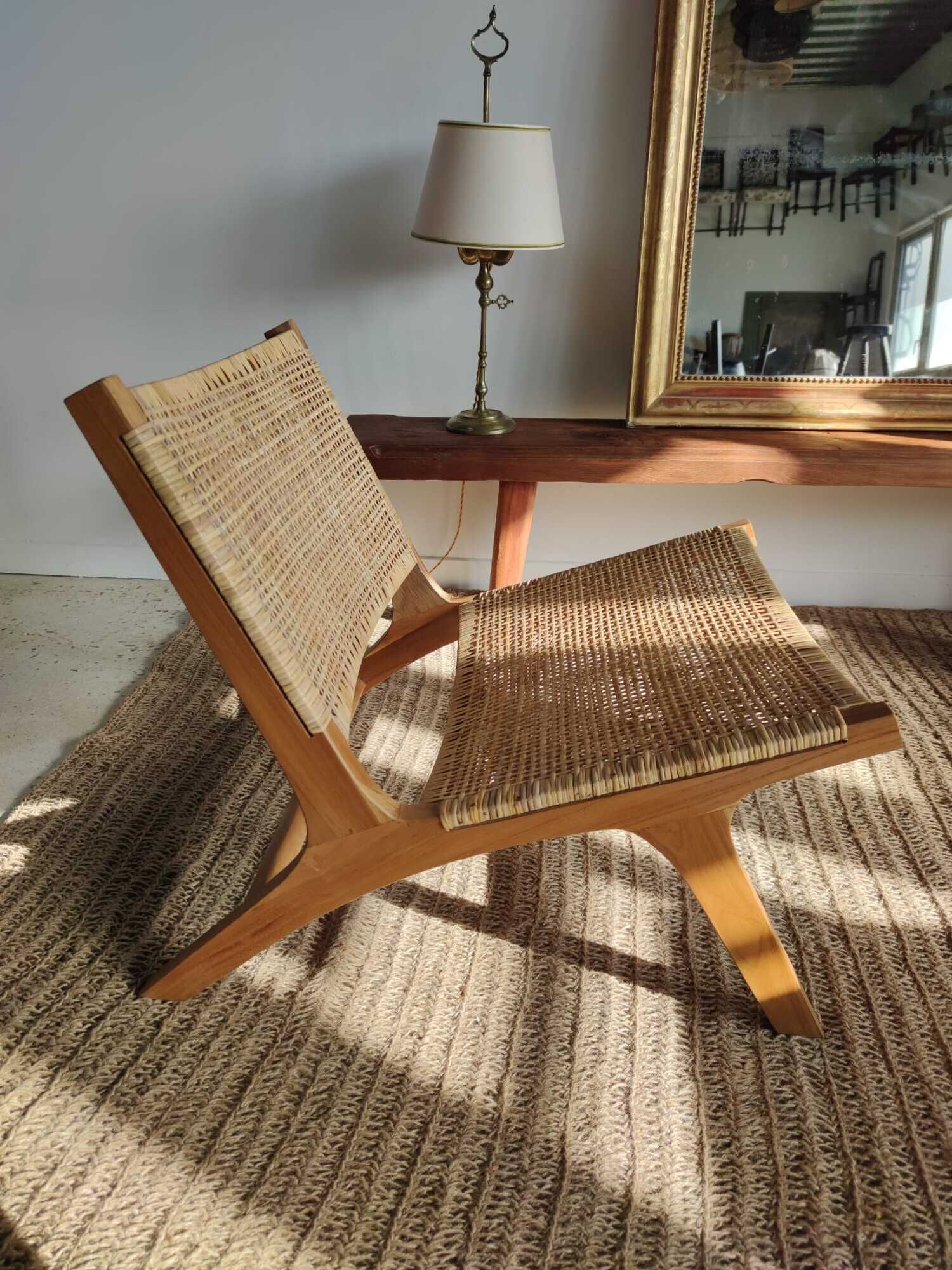 Reclining armchair in natural wood and woven rattan