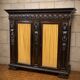 Important carved wooden library in Renaissance style, dating from the 19th century.