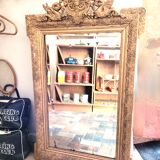 Old gilded mirror with pediment