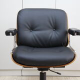 Vintage swivel office armchair in black leather and wood by Giroflex 60s