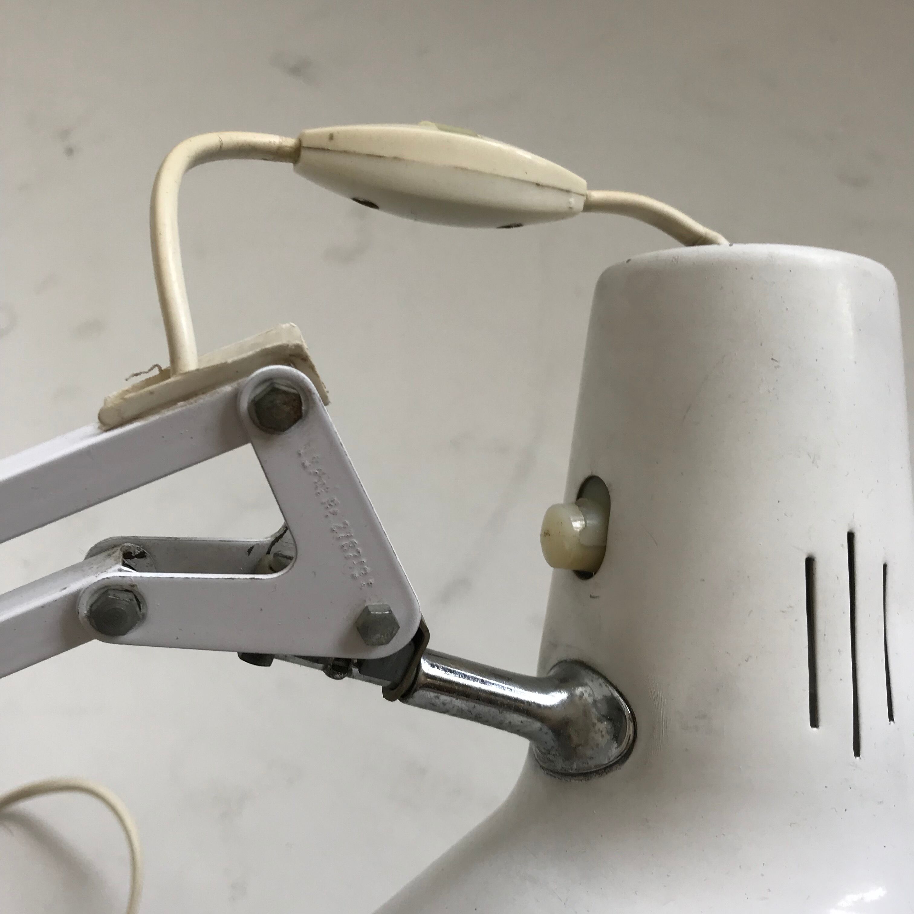 White hinged luxo lamp