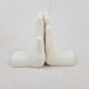 White ceramic book greenhouse representing hands 1980