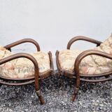 Vintage wicker armchair pair