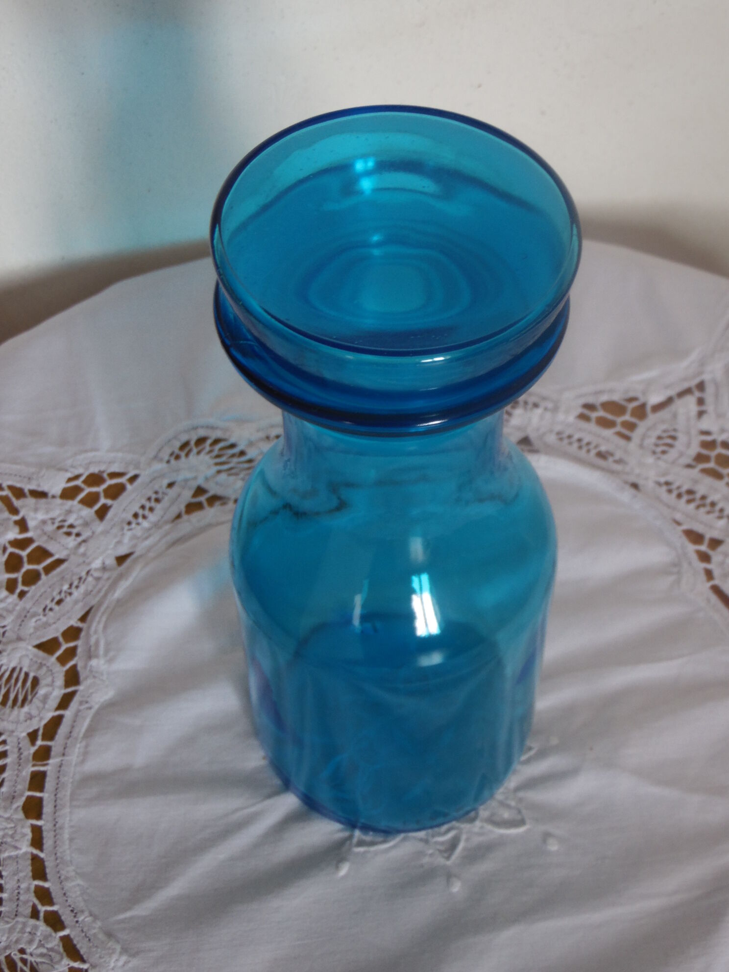 Large turquoise bottle lift 70's.