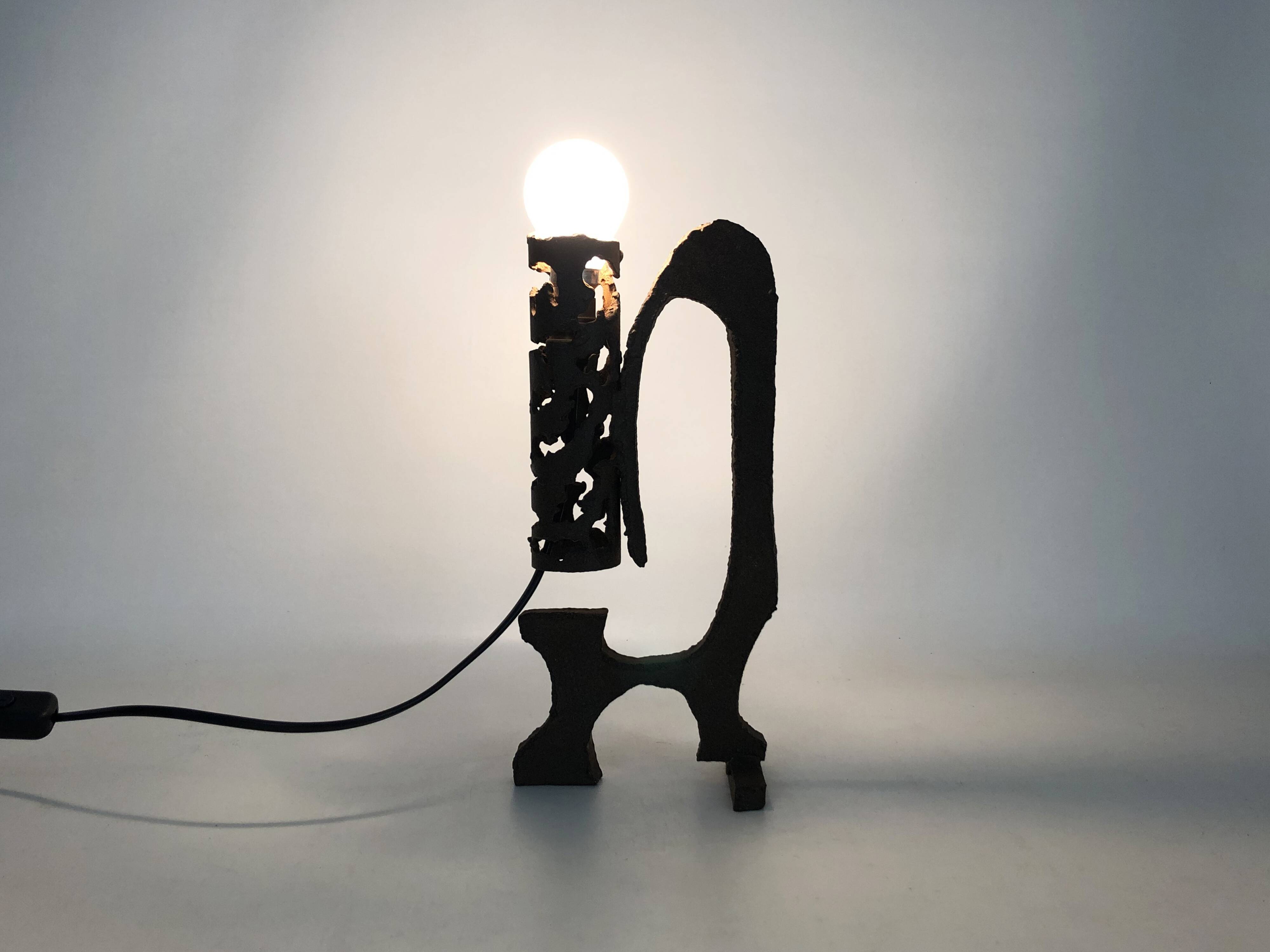 Pair of brutalist cast iron lamps, 1960s