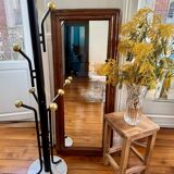 Brutalist stool in raw wood with a weathered effect.