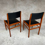 2 wooden and faux leather chairs in Scandinavian style