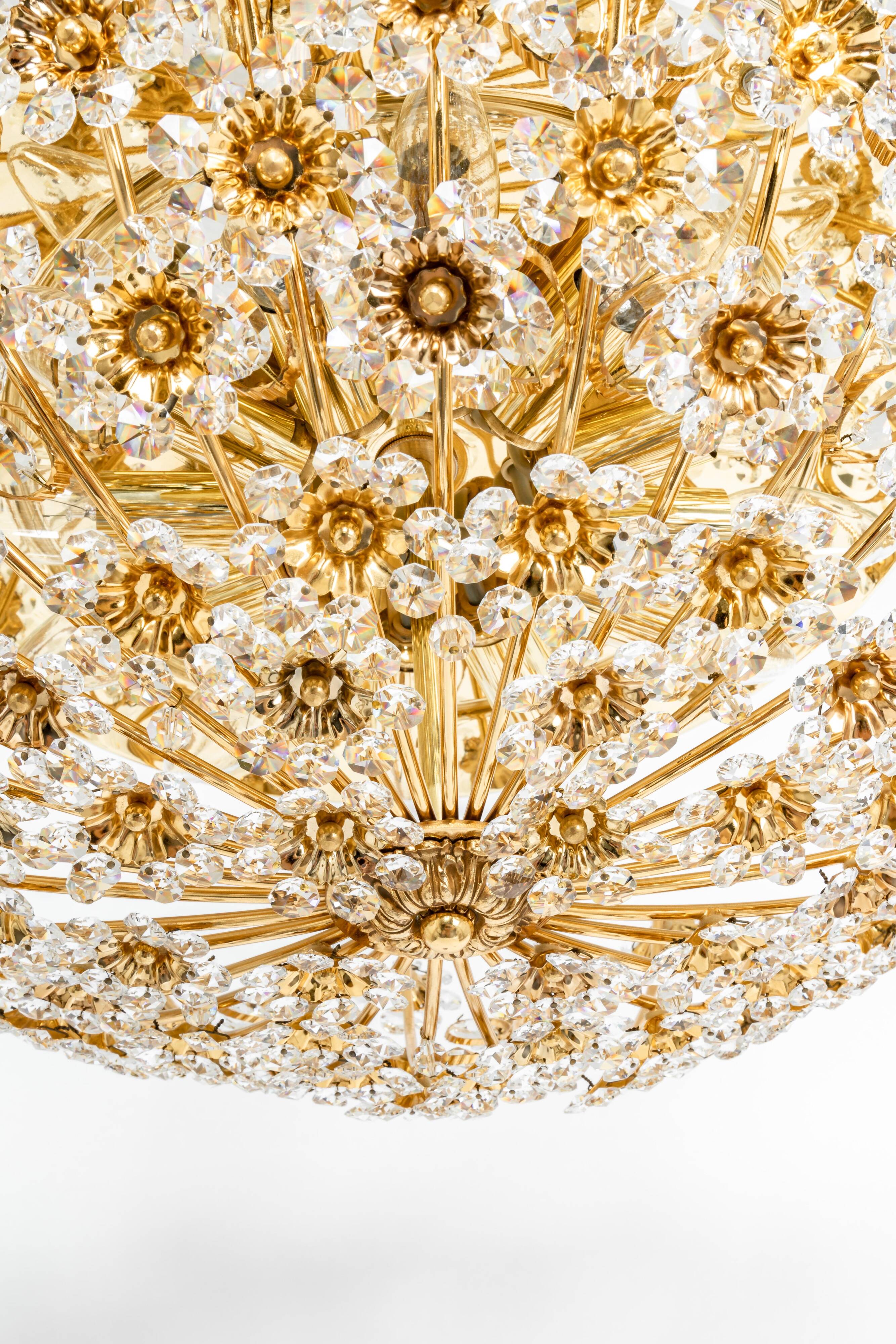 Small delicate ceiling light in gilded brass and cut glass in the shape of flowers by Palwa, Germany, 1970s.