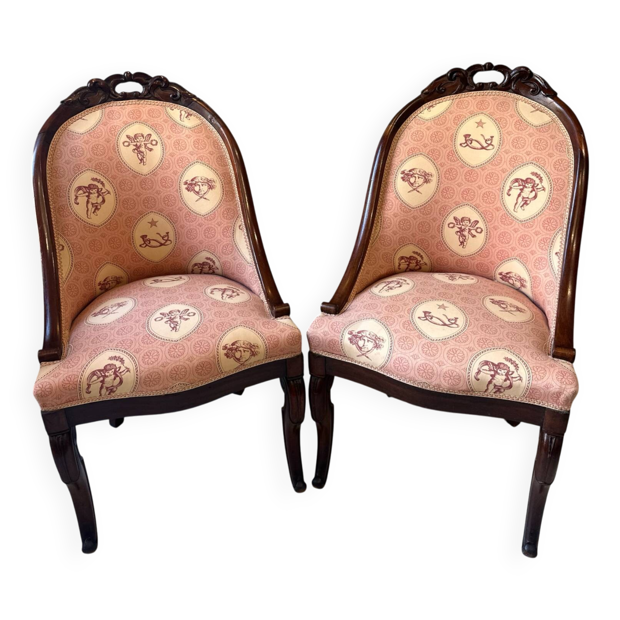 Pair of carved solid mahogany gondolas from the 19th century