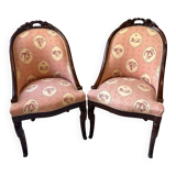 Pair of carved solid mahogany gondolas from the 19th century