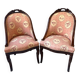 Pair of carved solid mahogany gondolas from the 19th century