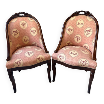 Pair of carved solid mahogany gondolas from the 19th century