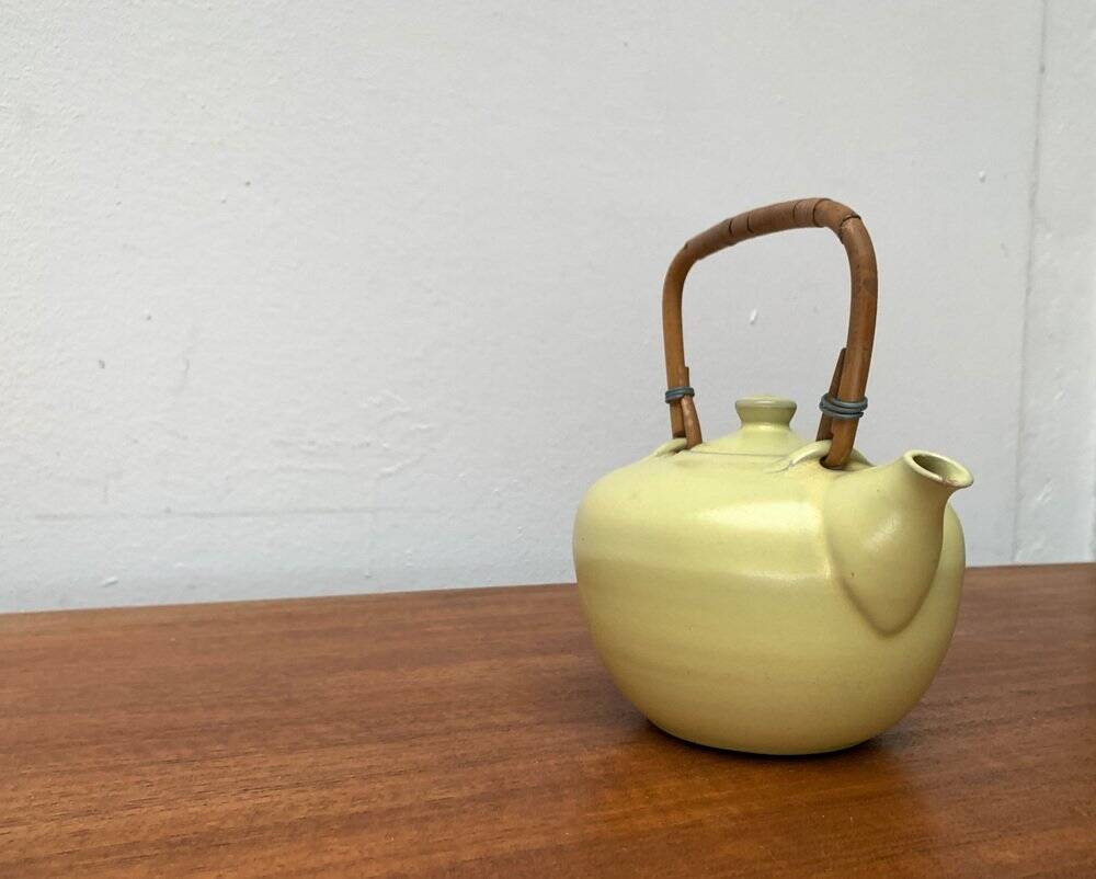 Mid-century ceramic teapot with bamboo handle, 1960s.