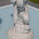 Pair of "cherub" candle holders in plaster