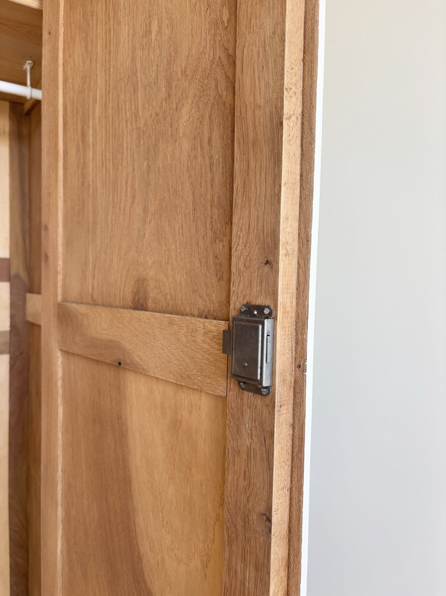Large Parisian wardrobe in renovated oak wood.