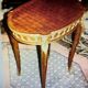 Living room table in Louis XV-Louis XVI transitional style with marquetry and bronze.