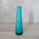 Curved turquoise blue blown glass soliflore vase