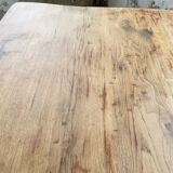 Oak farmhouse table and its two benches