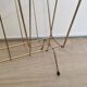 Vintage magazine rack in gold metal