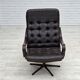 Fauteuil pivotant scandinave des années 1970, en cuir patchwork d'origine.