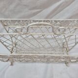 White wrought iron magazine holder
