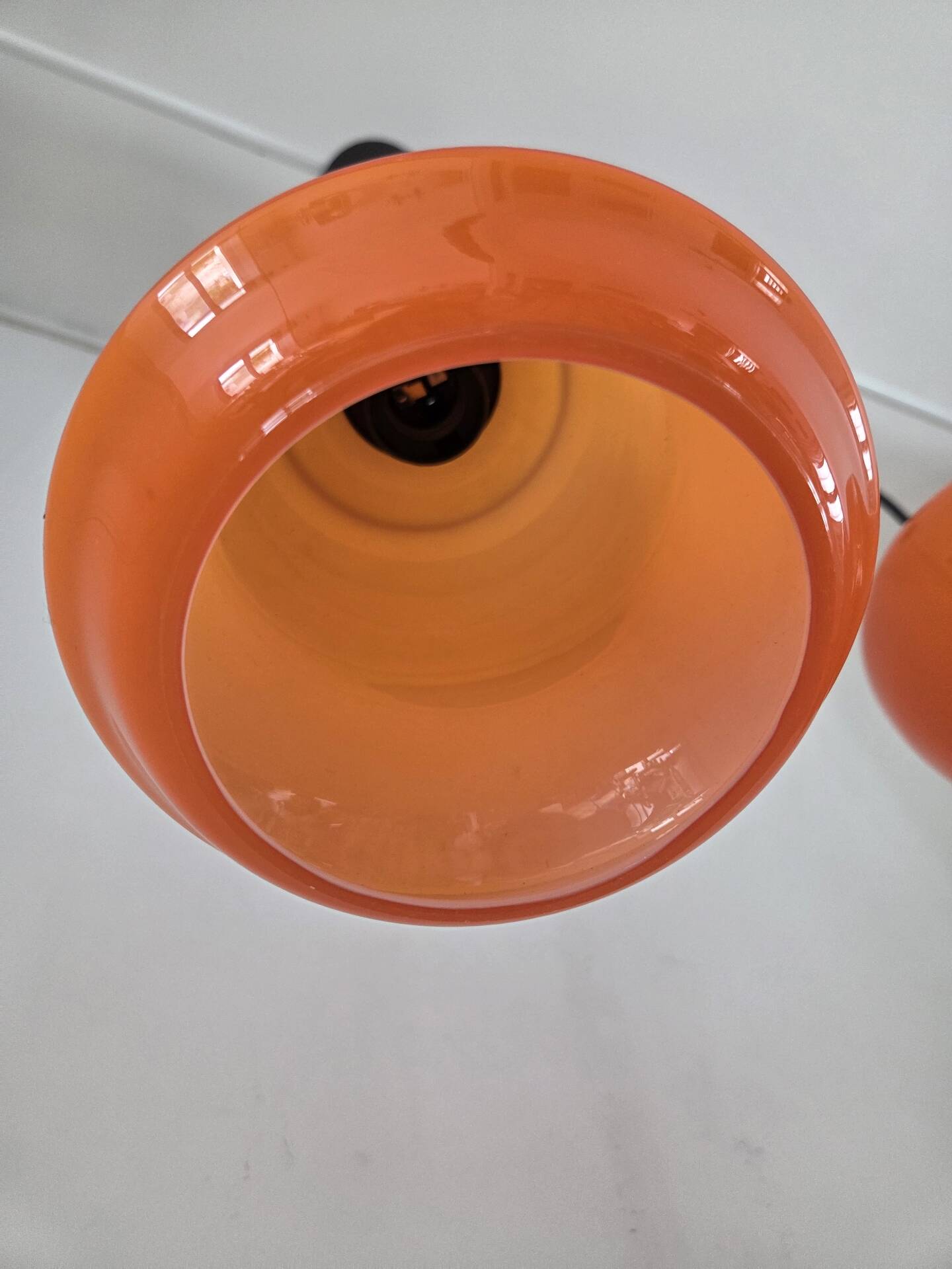Pair of orange Opaline pendant lights, 1970s