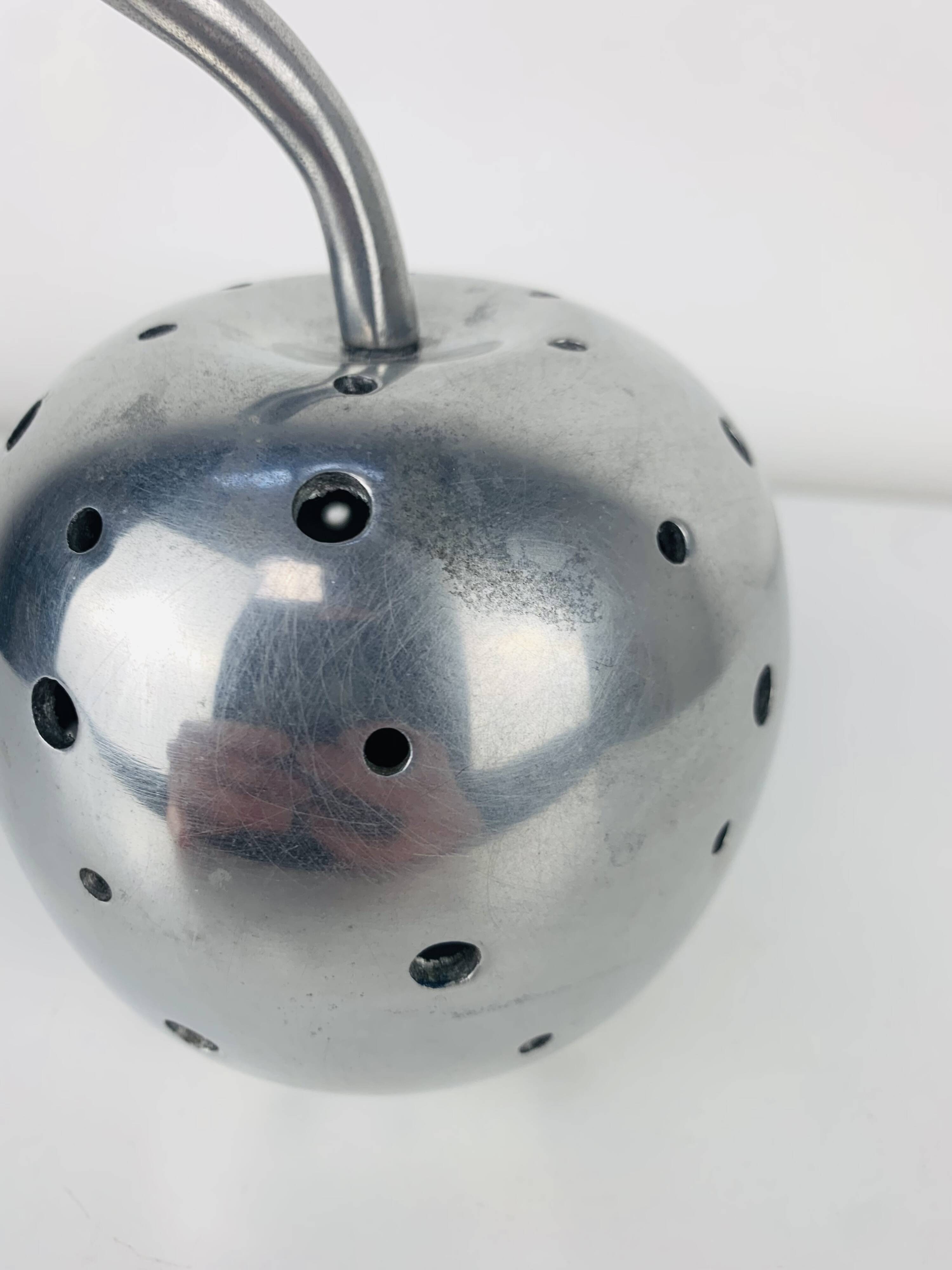 Aluminium apple sculpture, 1970s, candle holder