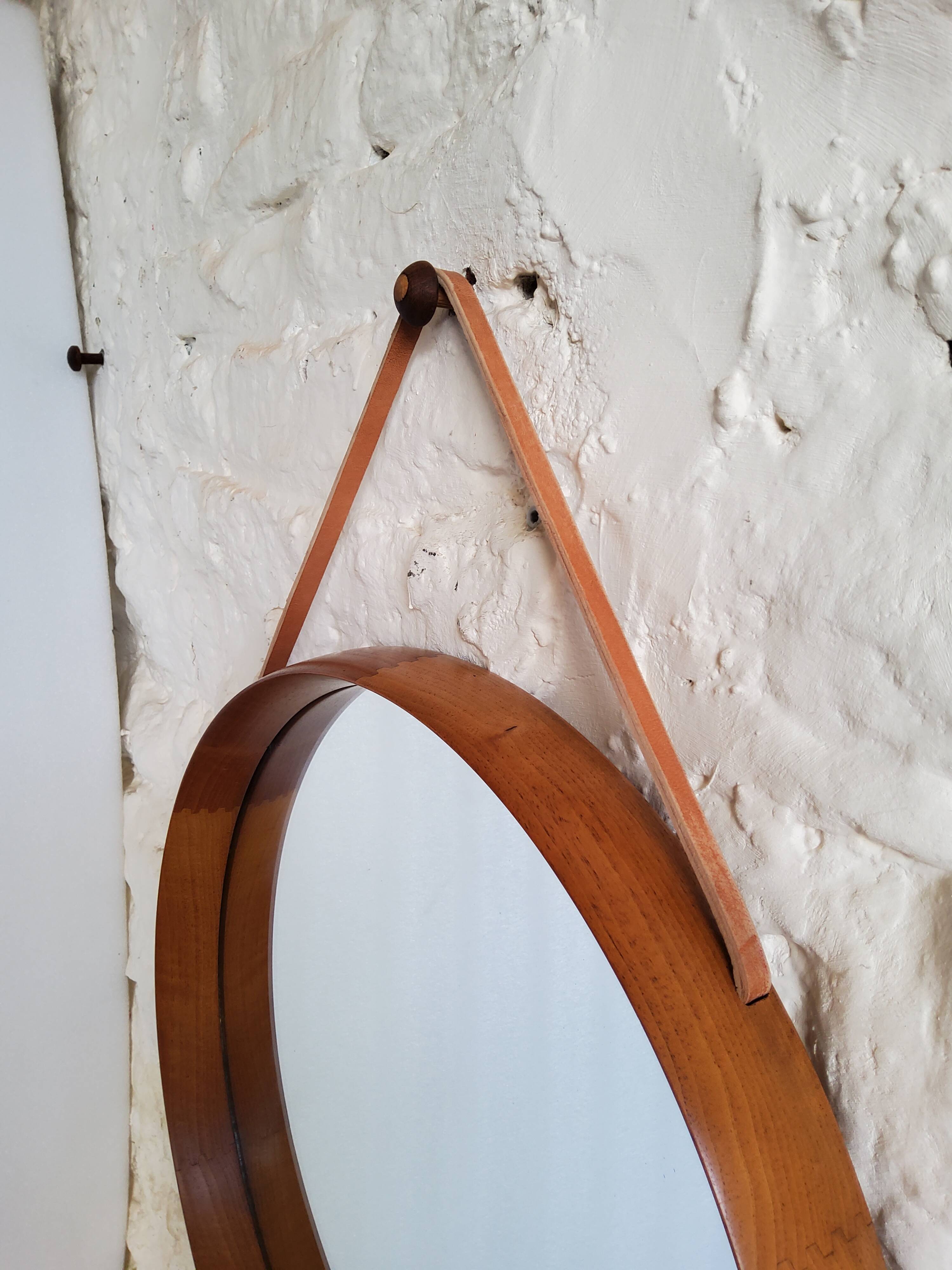 Round teak mirror by Uno and Osten Kristiansson for Luxus Vittsjö, Sweden.