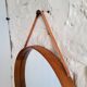 Round teak mirror by Uno and Osten Kristiansson for Luxus Vittsjö, Sweden.