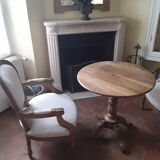 Old round table on centre foot