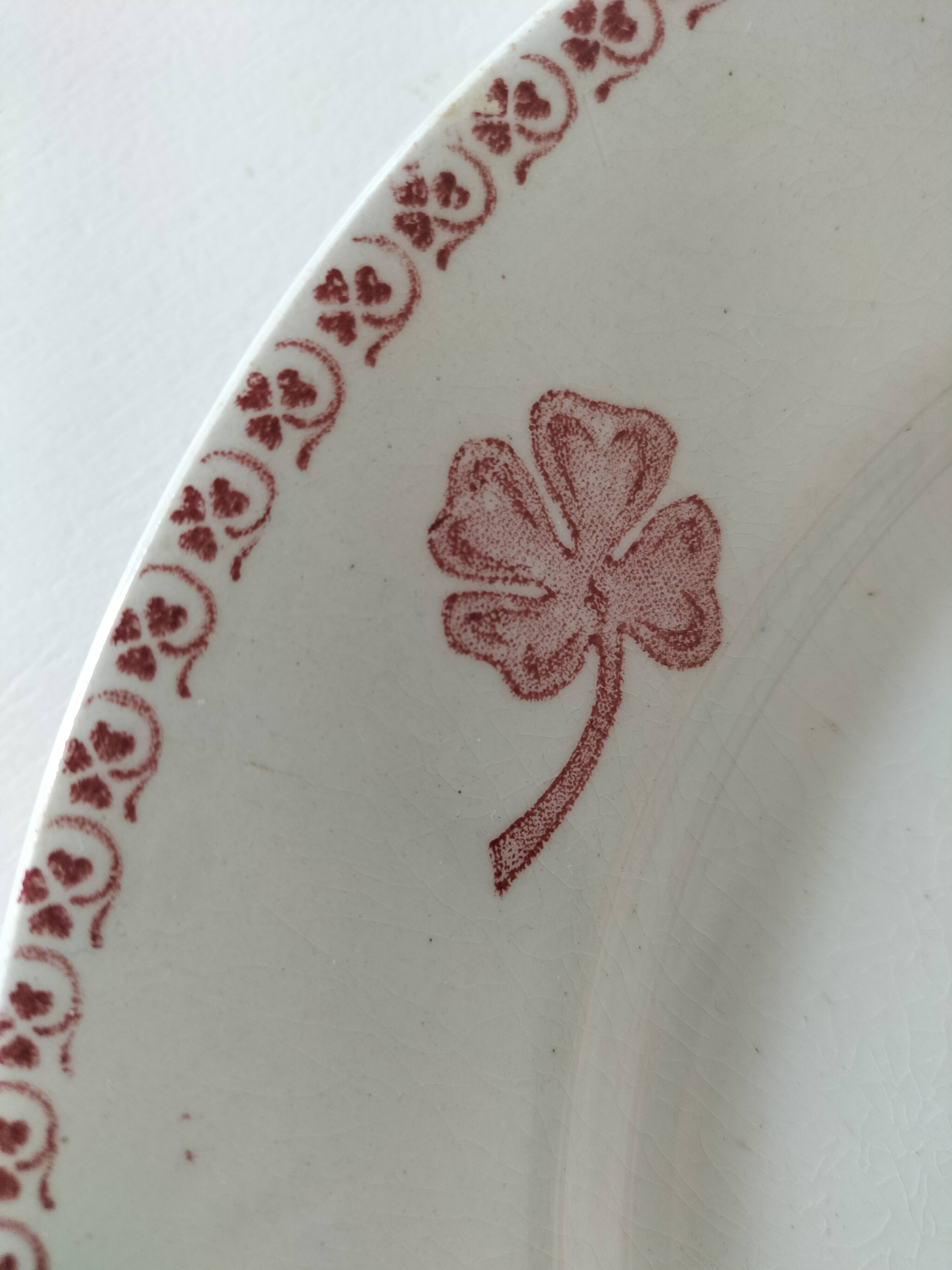 Duo of Lunéville flat plates, Lucien model – Clover decoration, early 20th century