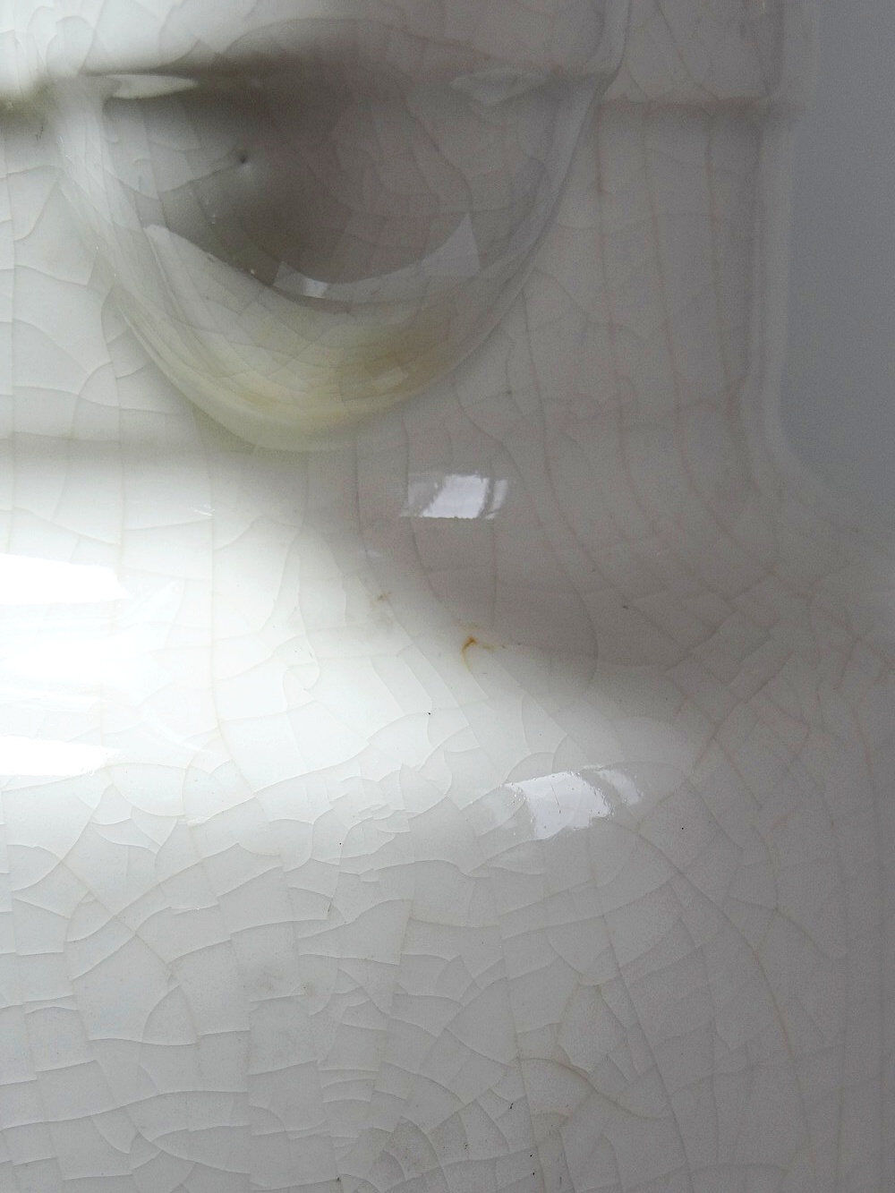 Large Art Deco toilet bowl, antique cracked faience.